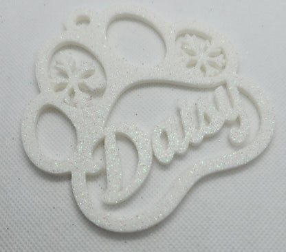 White paw print ornament with glitter and pet name
