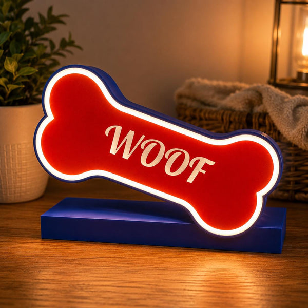Personalized dog bone light box glowing with a white border