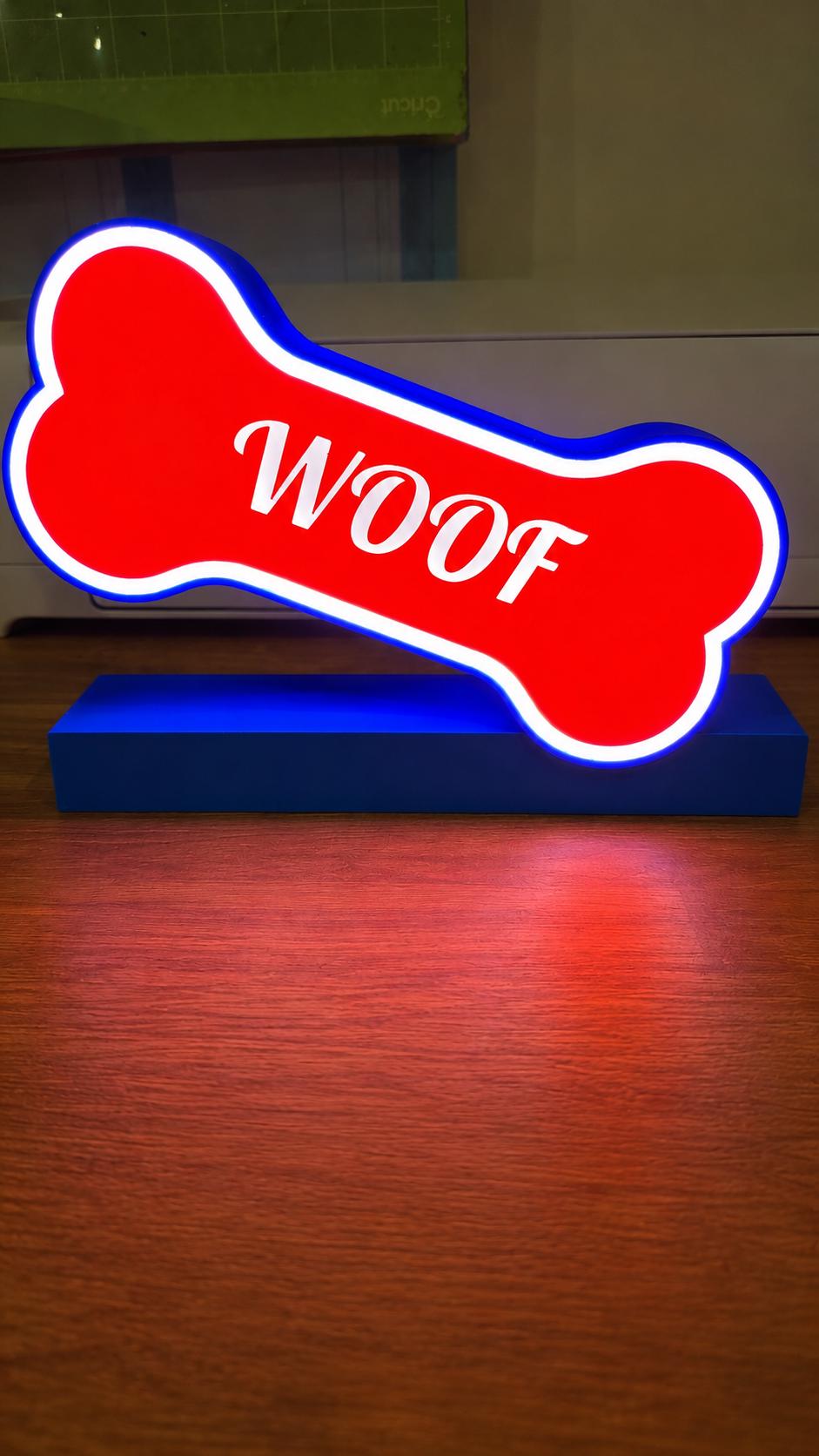 Dog bone light box lit up as pet room decor