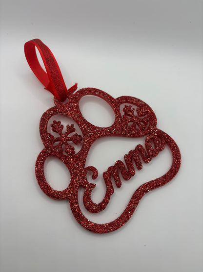 Paw print Christmas ornament personalized with a pet name